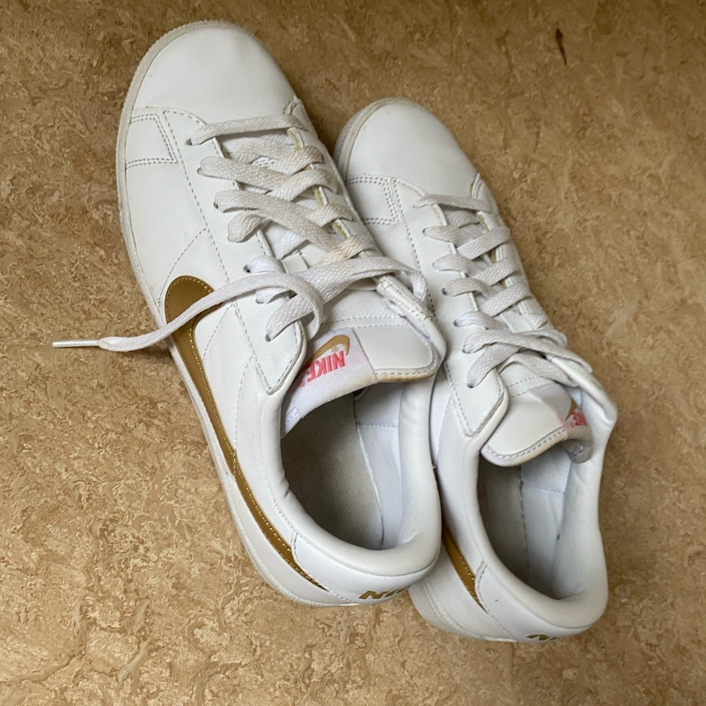 Nike Tennis Classic Trainers with Metallic Gold Swoosh
